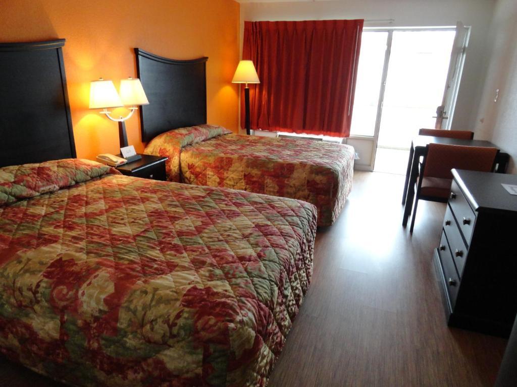 Econo Lodge Metropolis Cameră foto