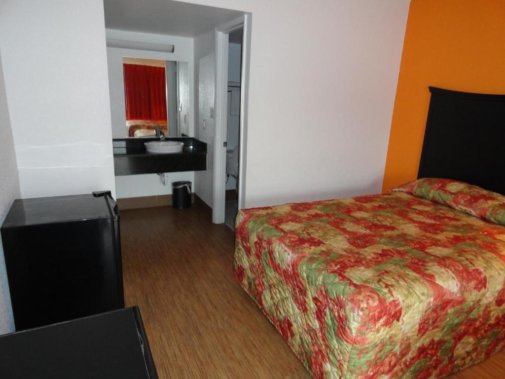 Econo Lodge Metropolis Cameră foto